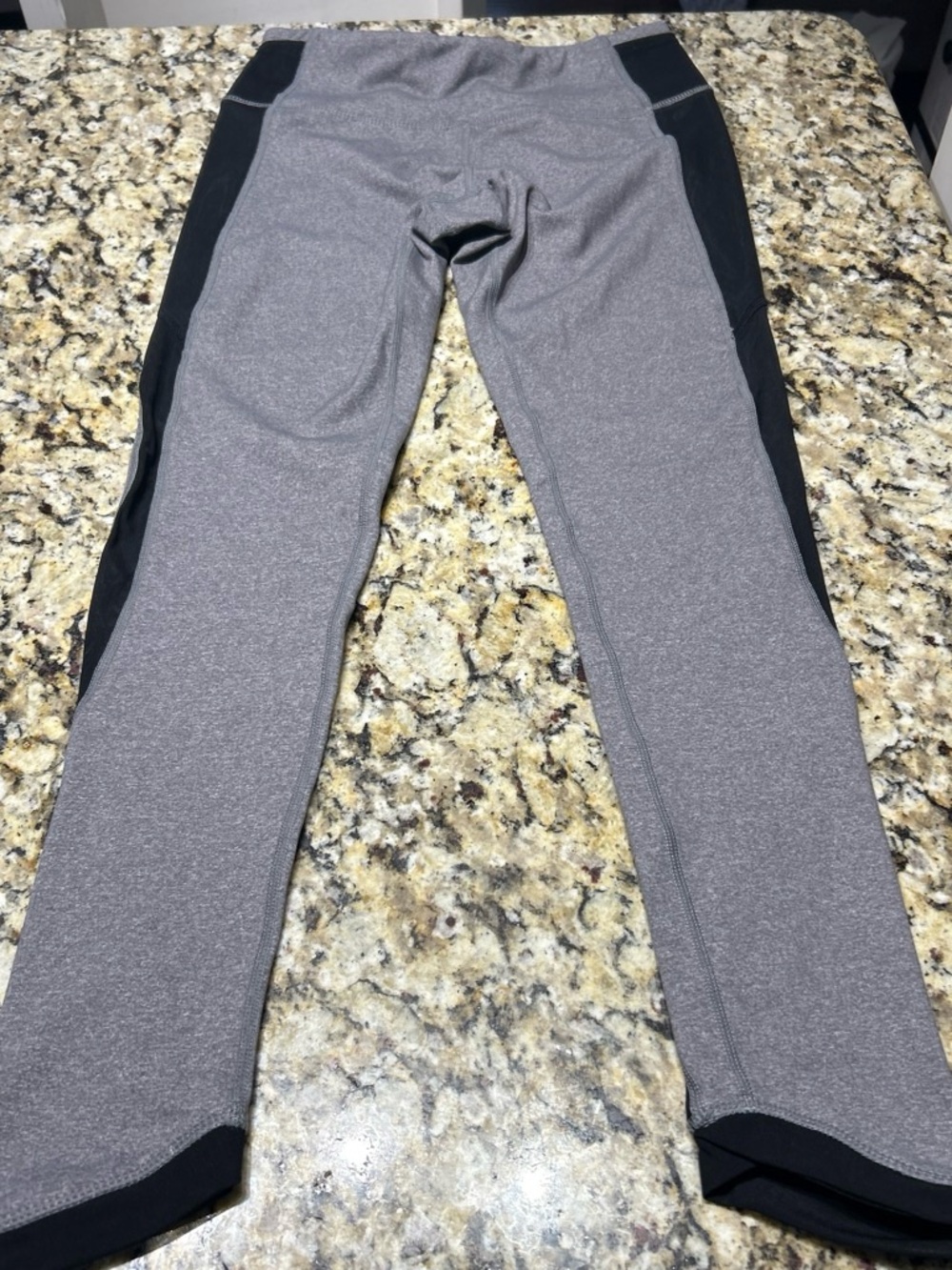 gray lululemon leggings with black side panels